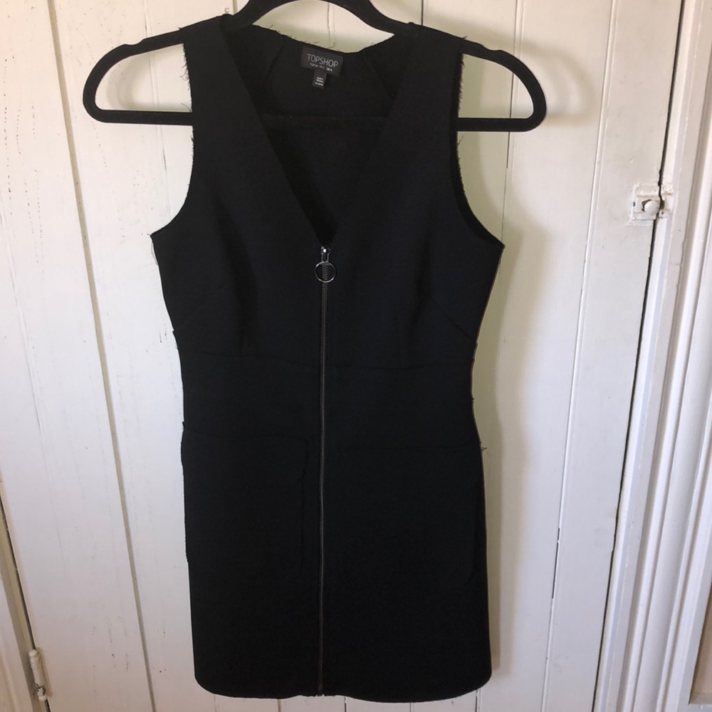 Top shop woman’s zipper down sleeveless dress